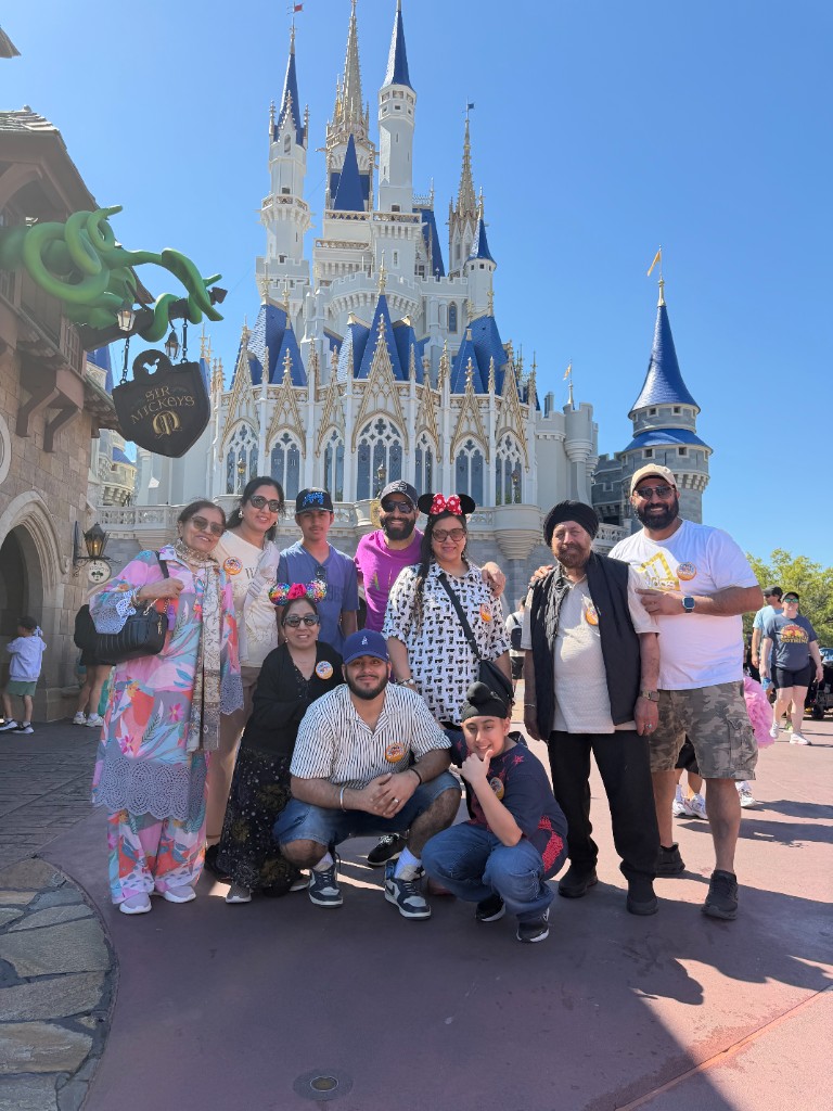 Family photo at Disney castle